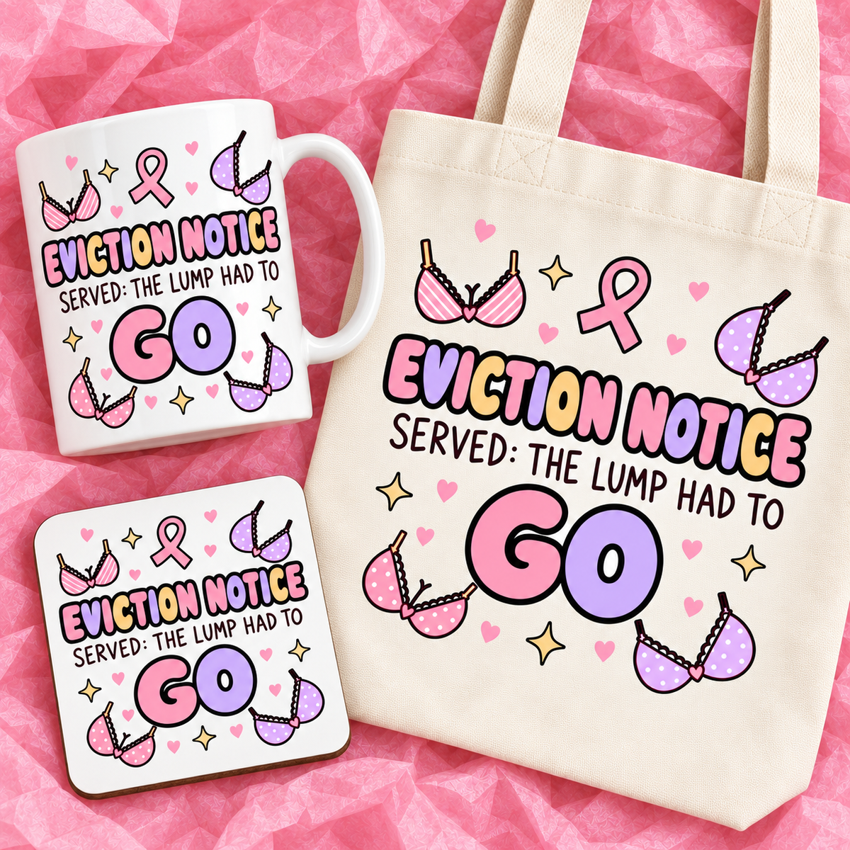 Matching breast cancer awareness gift set with 11oz mug, square ceramic coaster and tote bag on pink tissue paper.