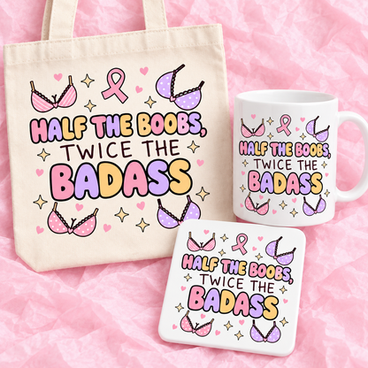 Matching breast cancer awareness gift set with 11oz mug, square ceramic coaster and tote bag on pink tissue paper.