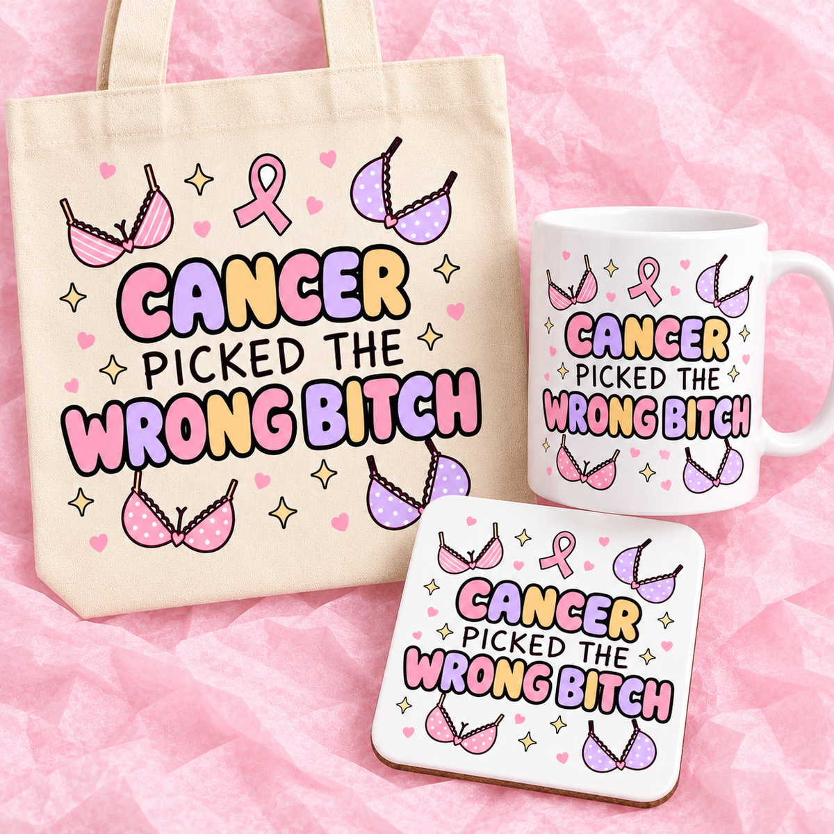 Matching breast cancer awareness gift set with 11oz mug, square ceramic coaster and tote bag on pink tissue paper.