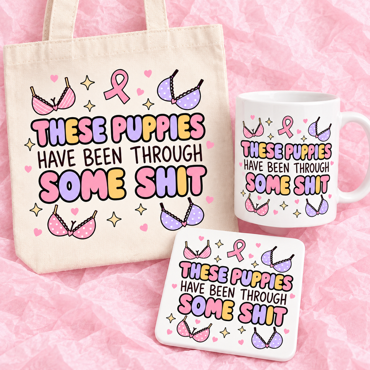 Matching breast cancer awareness gift set with 11oz mug, square ceramic coaster and tote bag on pink tissue paper.