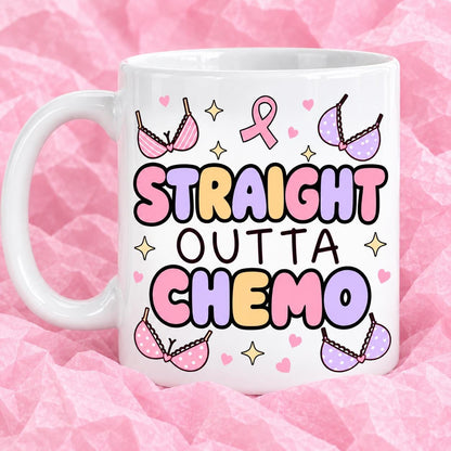 Breast cancer awareness 11oz ceramic mug with funny survivor design on pink tissue paper.