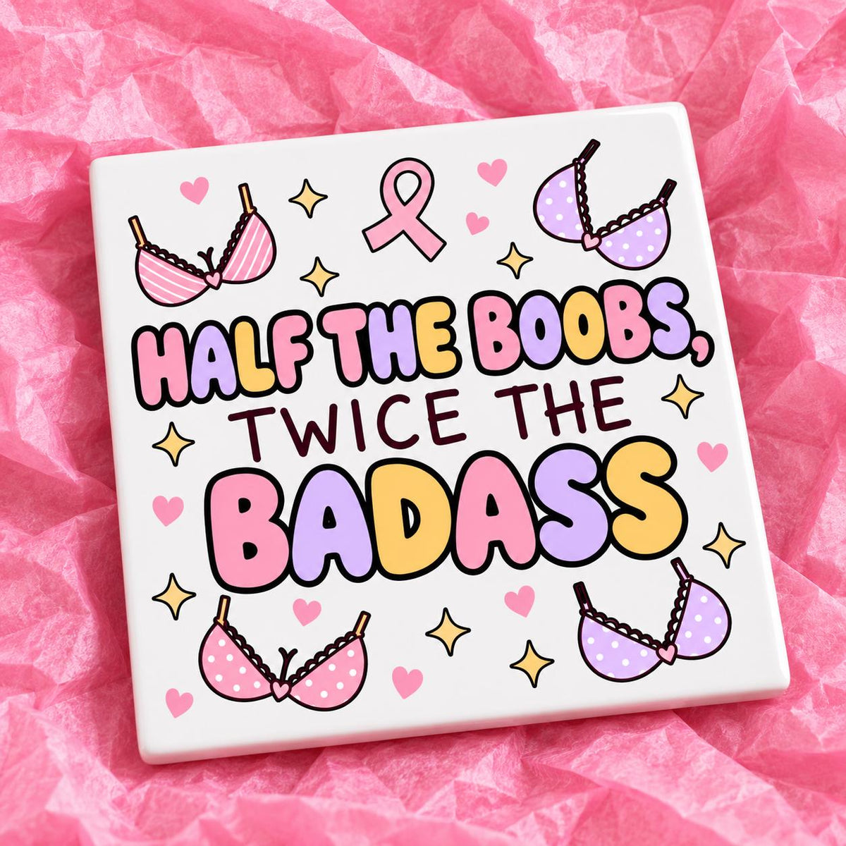 Square 10x10cm ceramic breast cancer awareness coaster with survivor design on pink tissue paper.