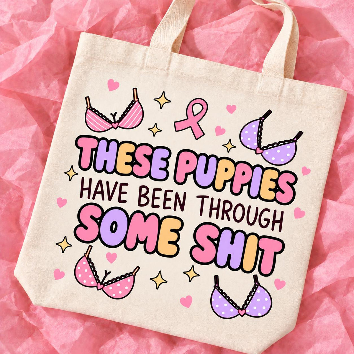 Breast cancer awareness 15x13 inch tote bag with funny survivor design on pink tissue paper.