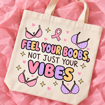 Breast cancer awareness 15x13 inch tote bag with funny survivor design on pink tissue paper.