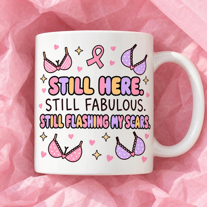 Breast cancer awareness 11oz ceramic mug with funny survivor design on pink tissue paper.