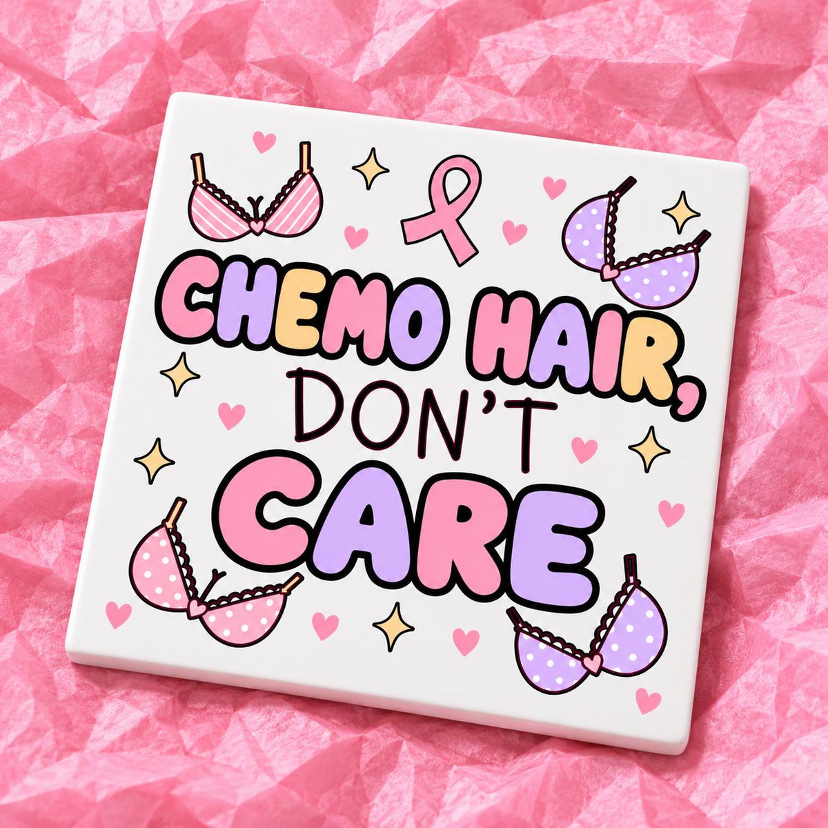 Square 10x10cm ceramic breast cancer awareness coaster with survivor design on pink tissue paper.