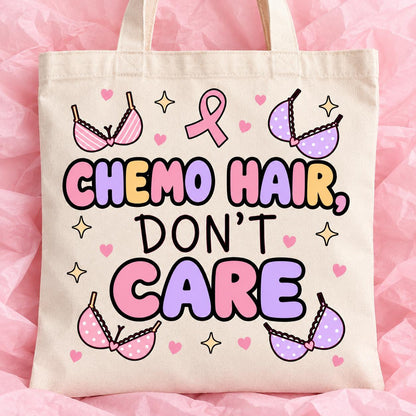 Breast cancer awareness 15x13 inch tote bag with funny survivor design on pink tissue paper.