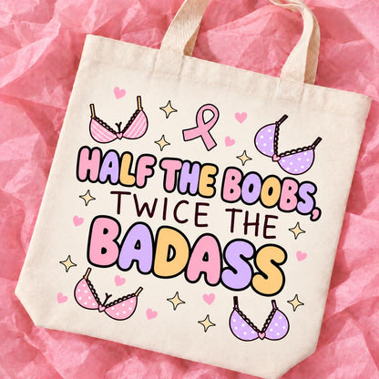 Breast cancer awareness 15x13 inch tote bag with funny survivor design on pink tissue paper.